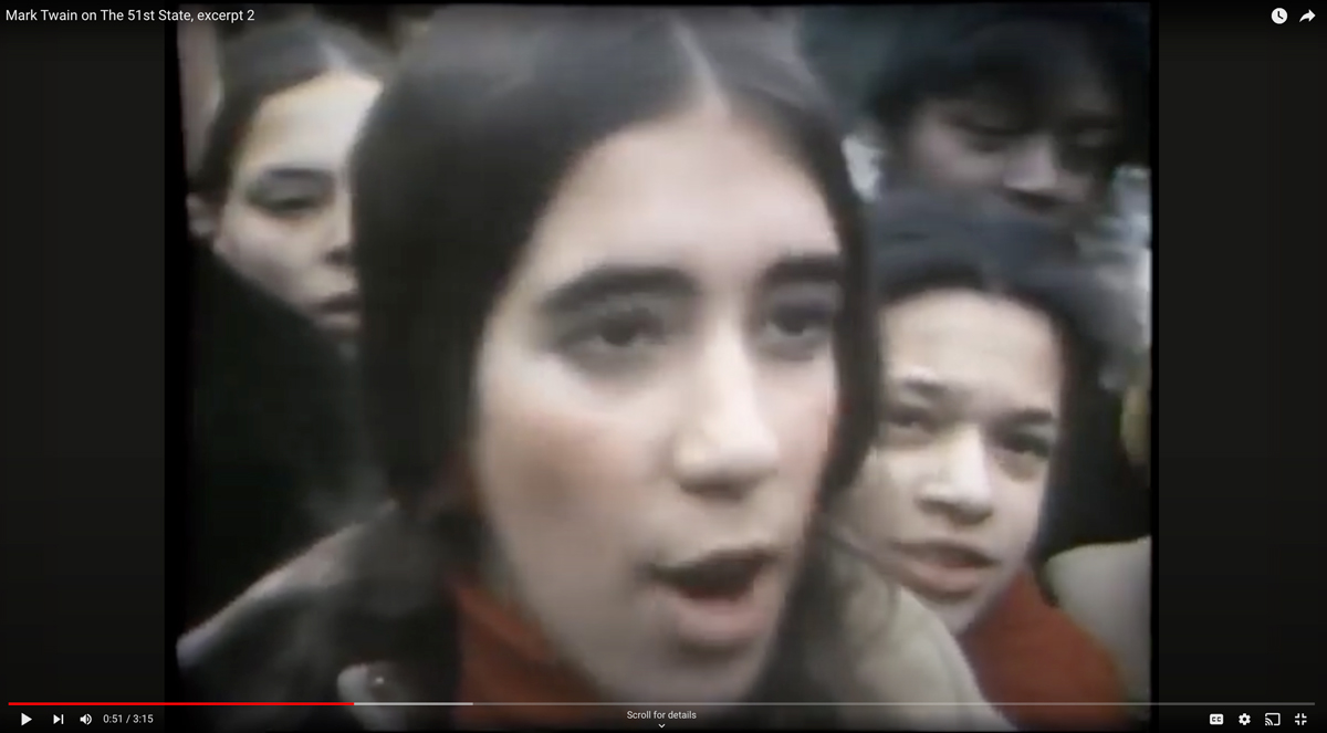 Still image from a news report showing a young Puerto Rican woman being interviewed