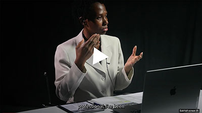 Still image of a videotaped reading by Nicolyn Plummer