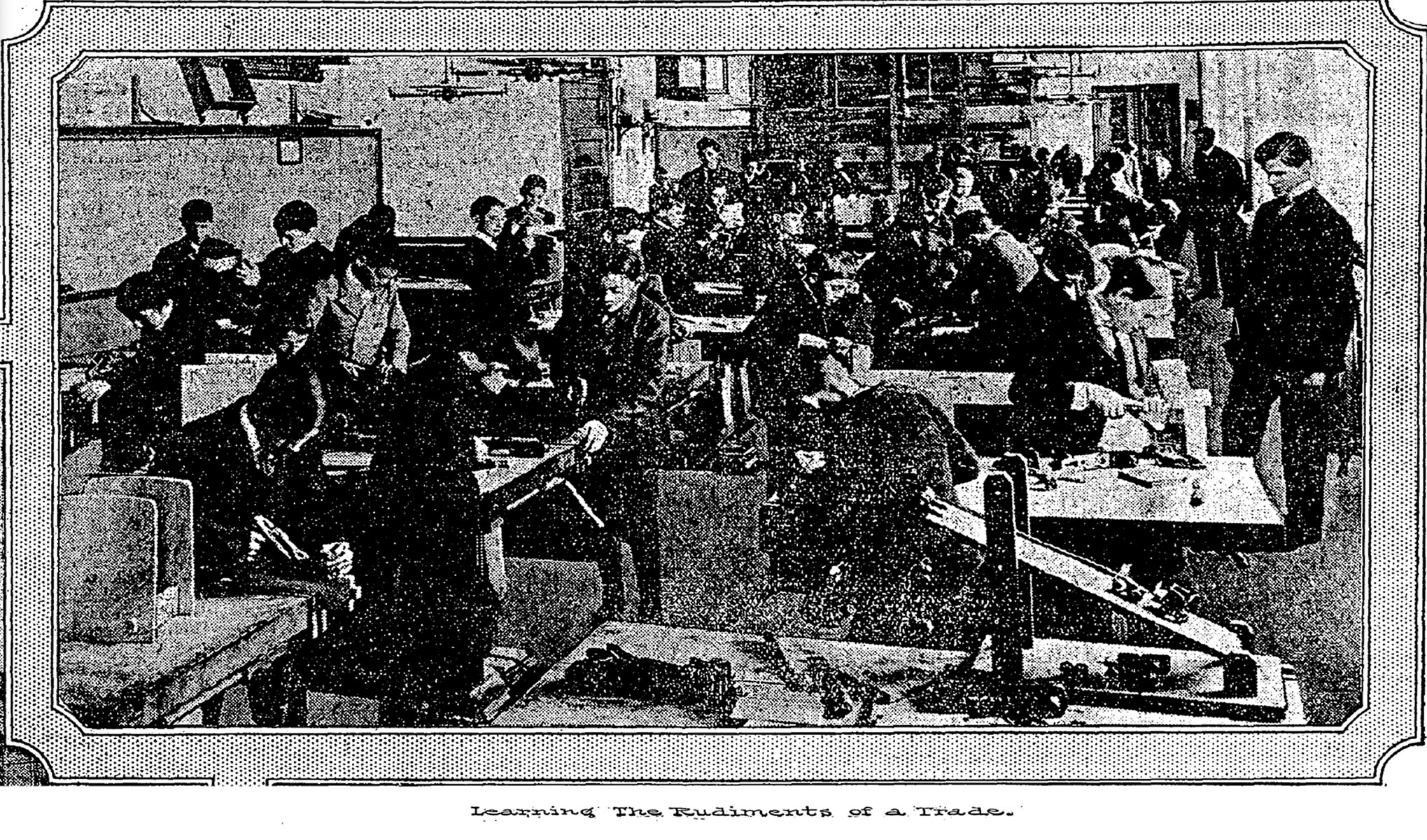 Boys of different ages work in a woodshop