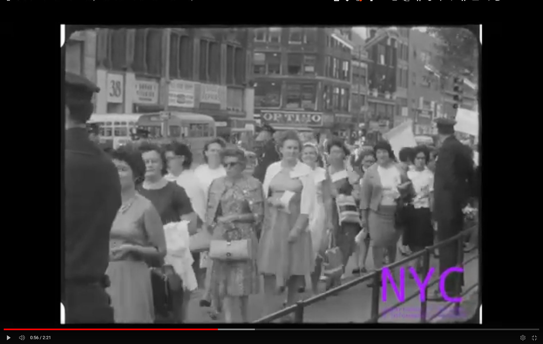 White women carry signs protesting desegregation