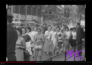 White women carry signs protesting desegregation