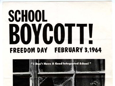 Flyer for school boycott showing a young Black child looking through a broken window