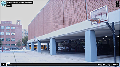 Video frame showing the outside of a school